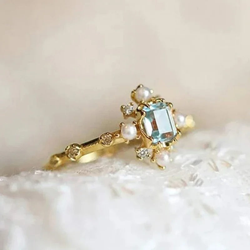 Bague vintage avec perle bleue | Or