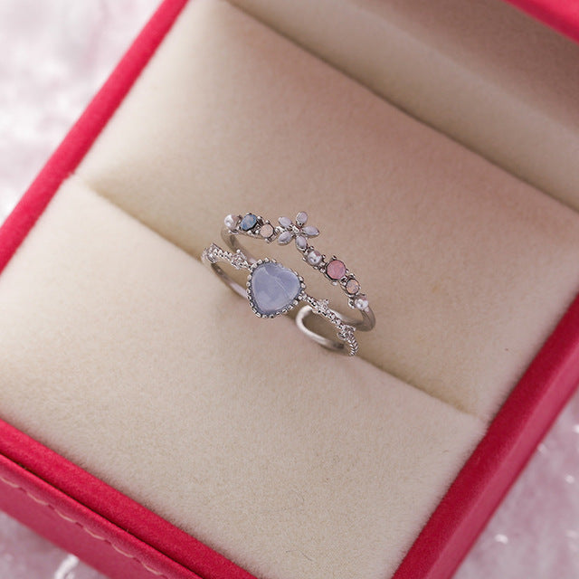 Bague ajustable avec pierre bleue | Or blanc