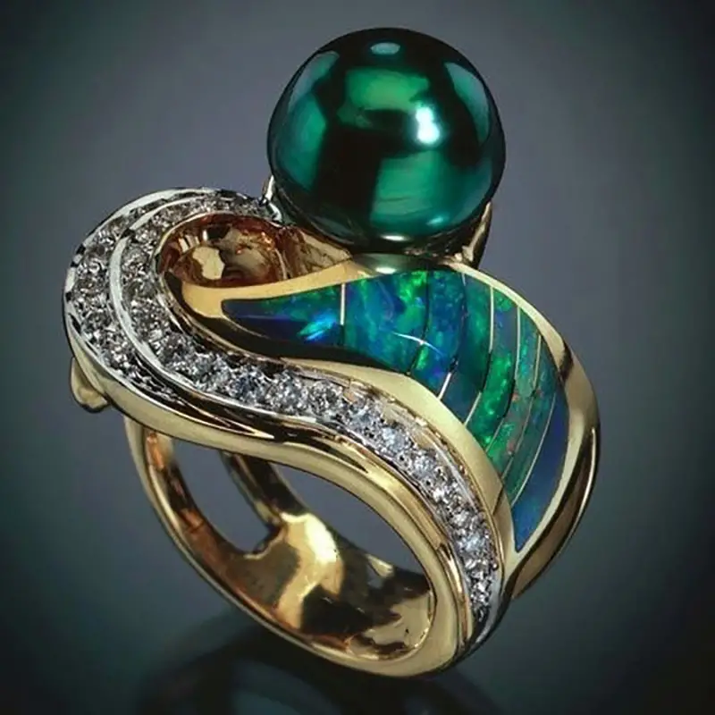 Bague rétro à brillants verts | Or