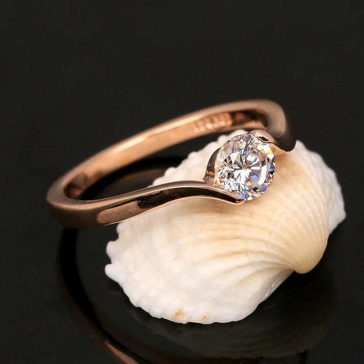 Bague rétro avec solitaire et diamants ronds | Or rose