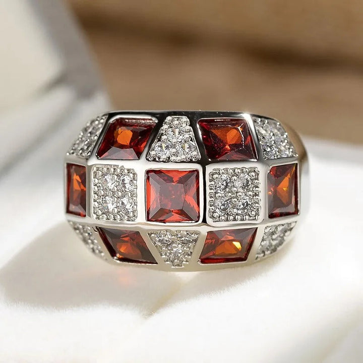 Bague vintage avec des pierres précieuses rouges | Or blanc