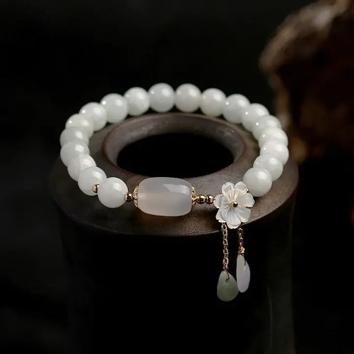 Bracelet avec Aigue-marine et marguerites | Or