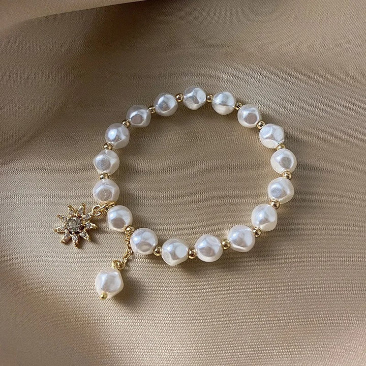 Bracelet avec médaillon, marguerite et tournesol | Or blanc