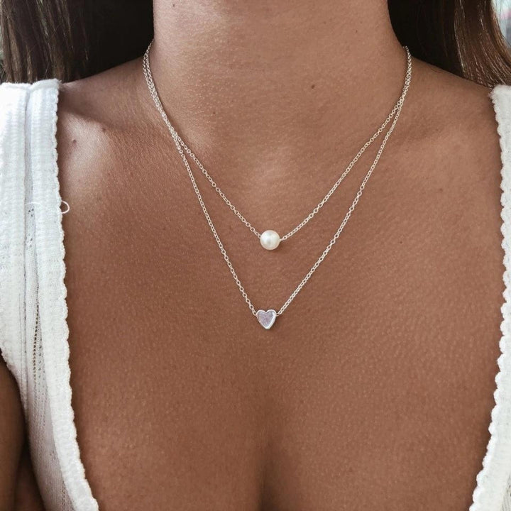 Collier avec cœur et marguerites | Or blanc