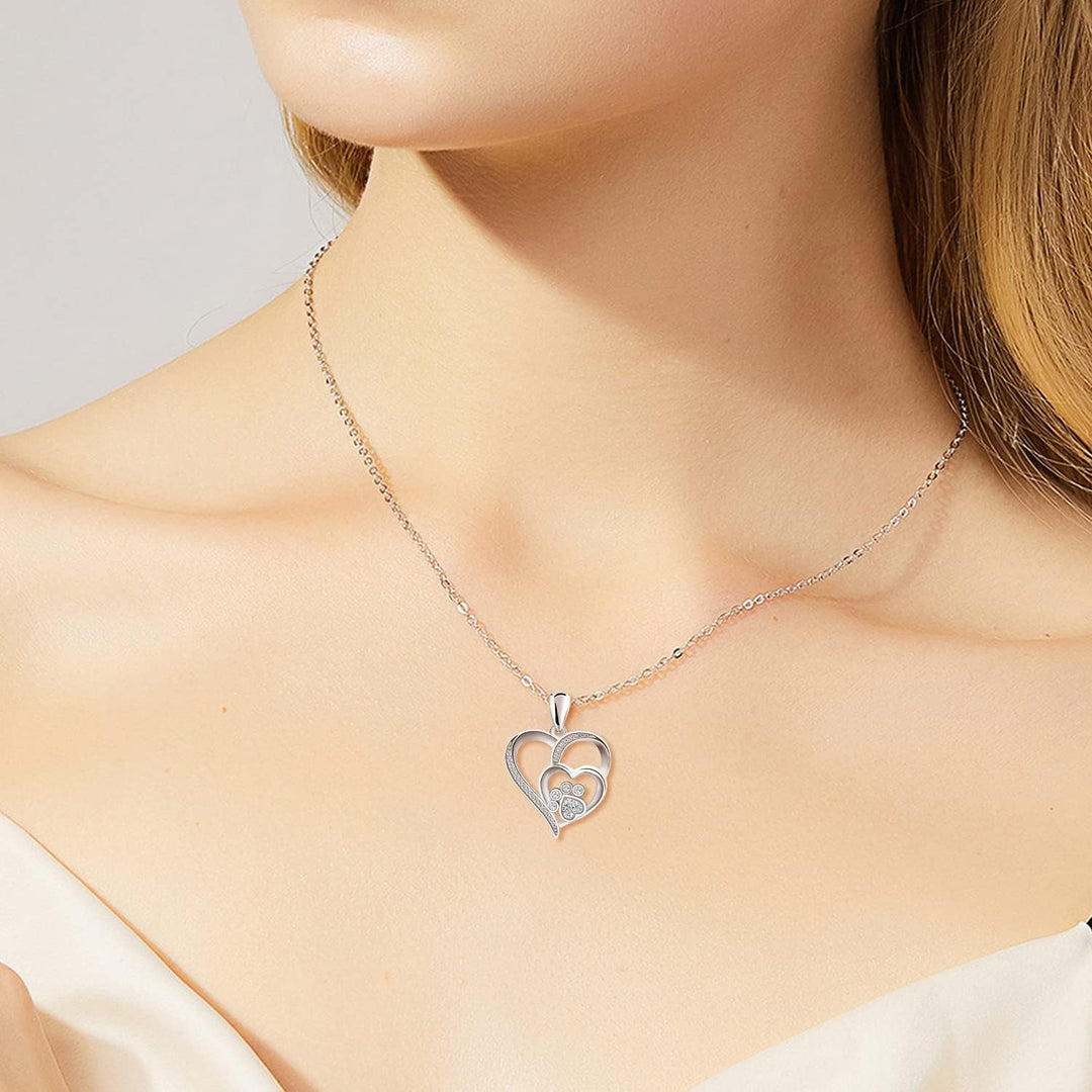 Collier avec patte et cœur à brillants | Or blanc